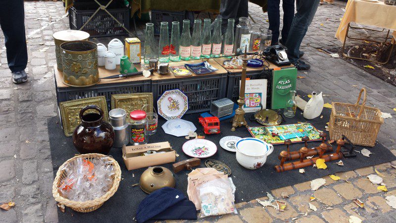 Burgundy Flea Market vendor display of knick knacks